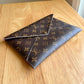 Monogram Kirigami Pochette (Large)