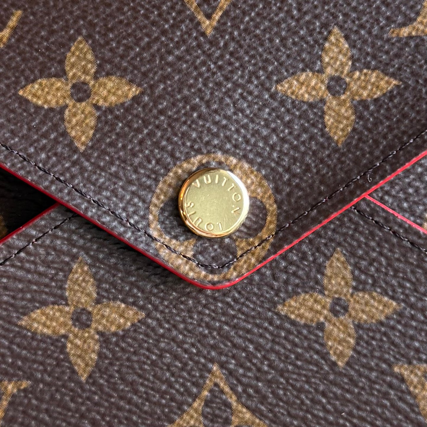 Monogram Kirigami Pochette (Medium)