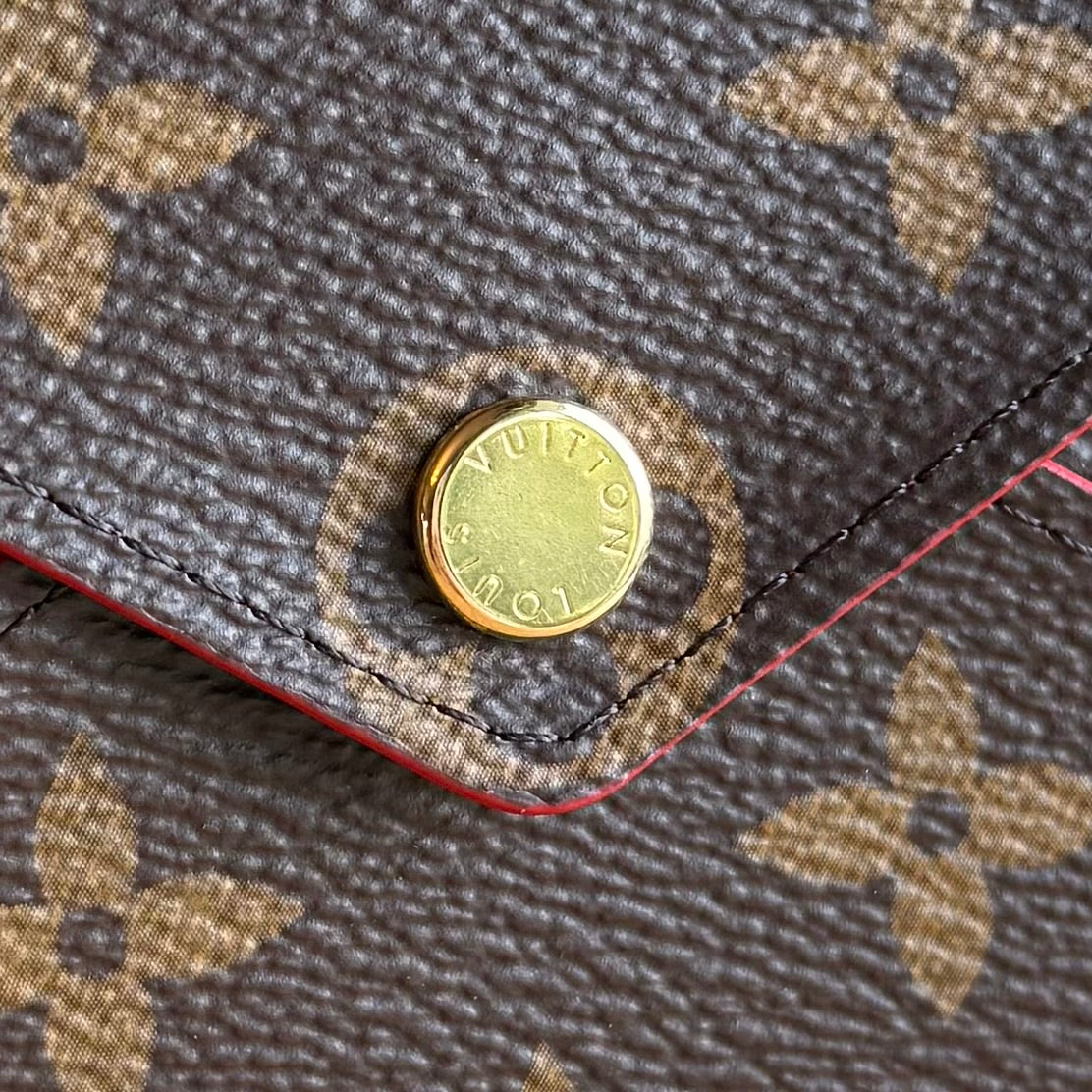 Monogram Kirigami Pochette (Medium)