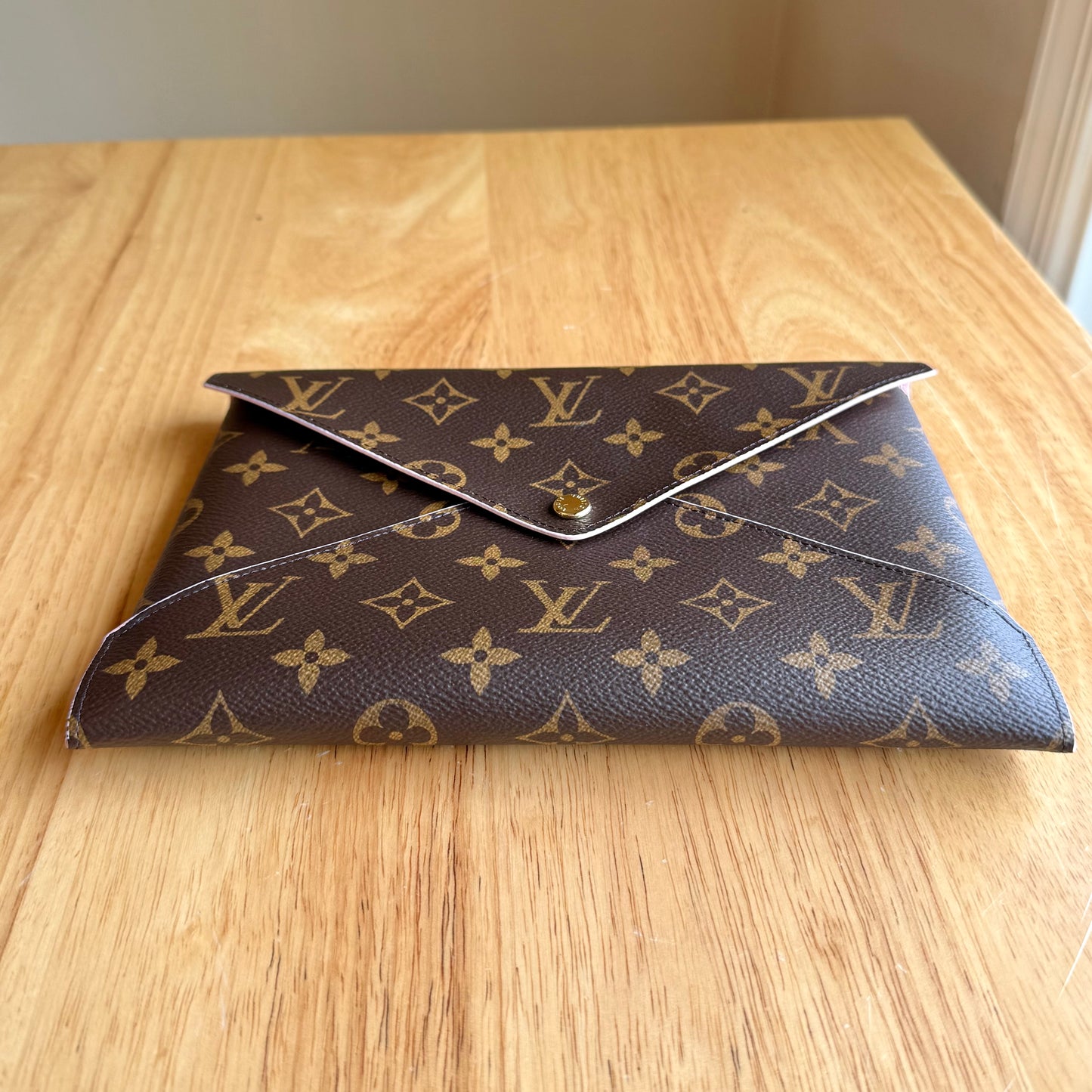 Monogram Kirigami Pochette (Large)