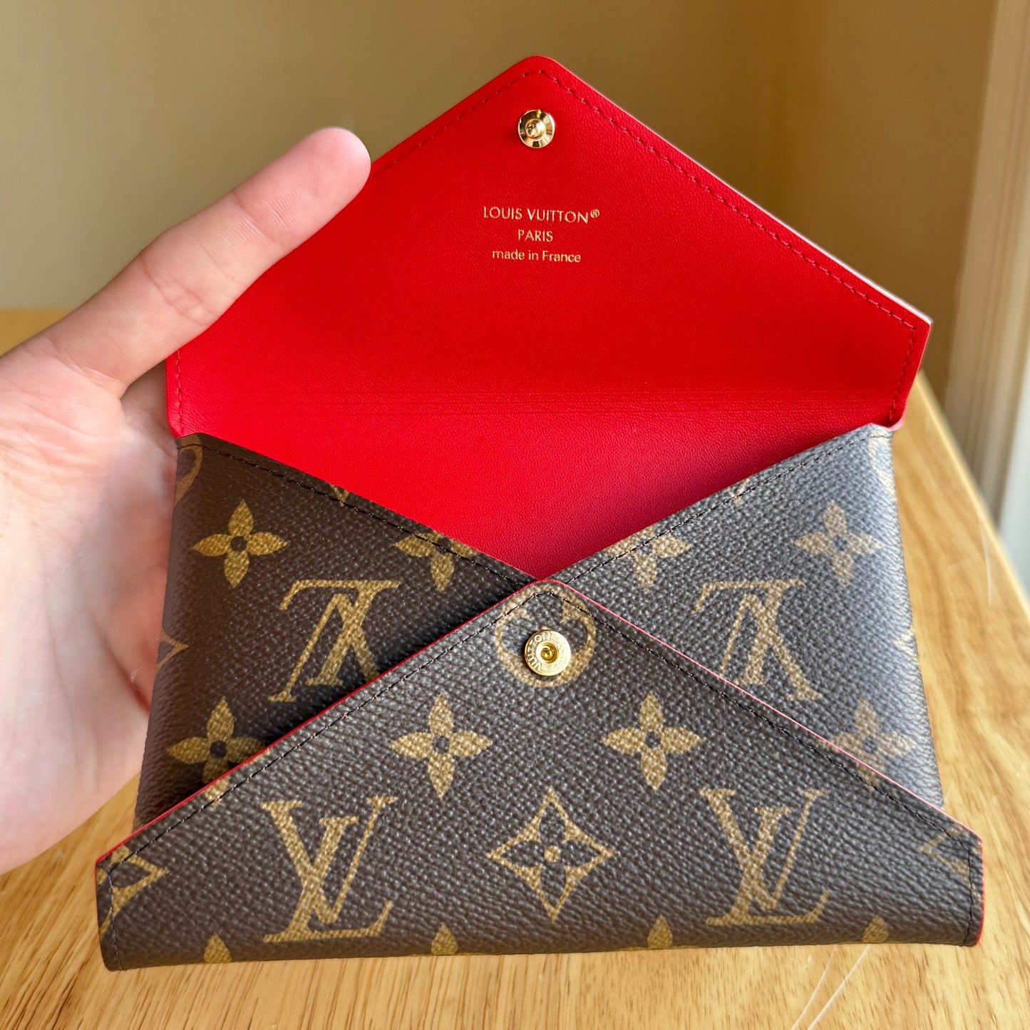 Monogram Kirigami Pochette (Medium)