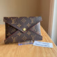 Monogram Kirigami Pochette (Medium)