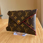 Monogram Kirigami Pochette (Medium)