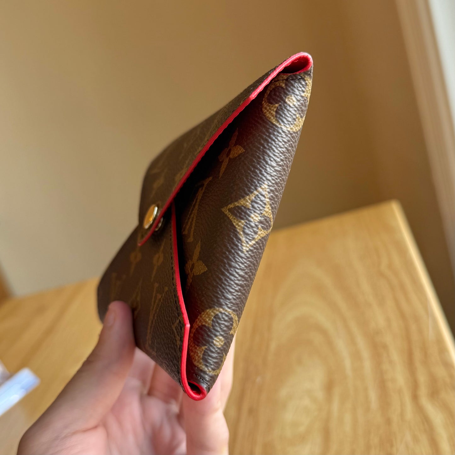 Monogram Kirigami Pochette (Medium)