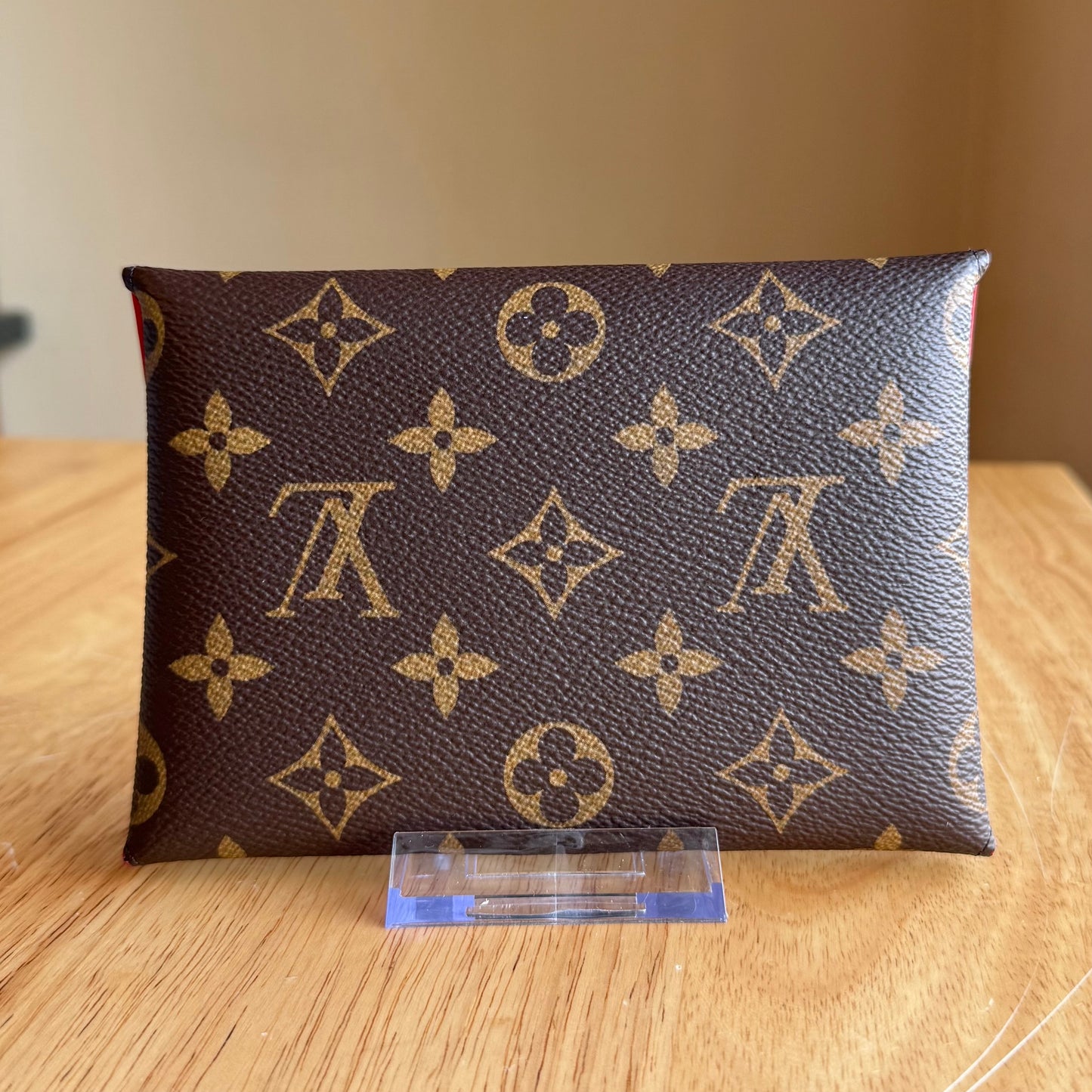 Monogram Kirigami Pochette (Medium)