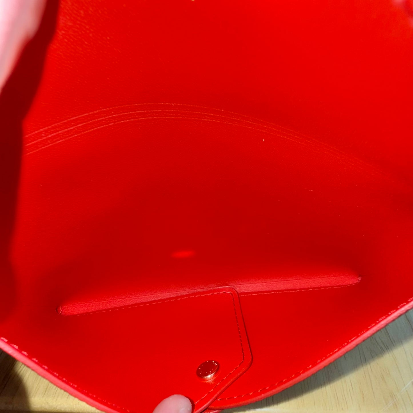 Monogram Kirigami Pochette (Medium)