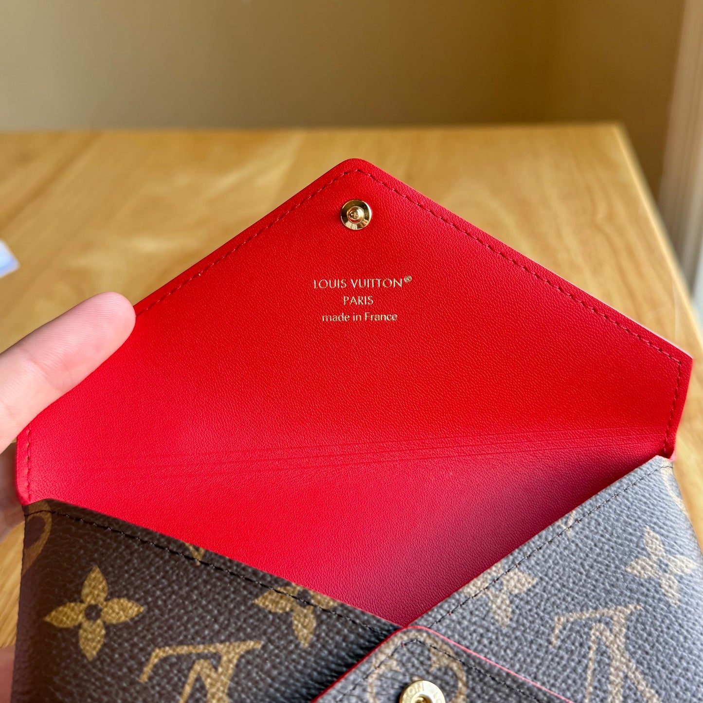 Monogram Kirigami Pochette (Medium)