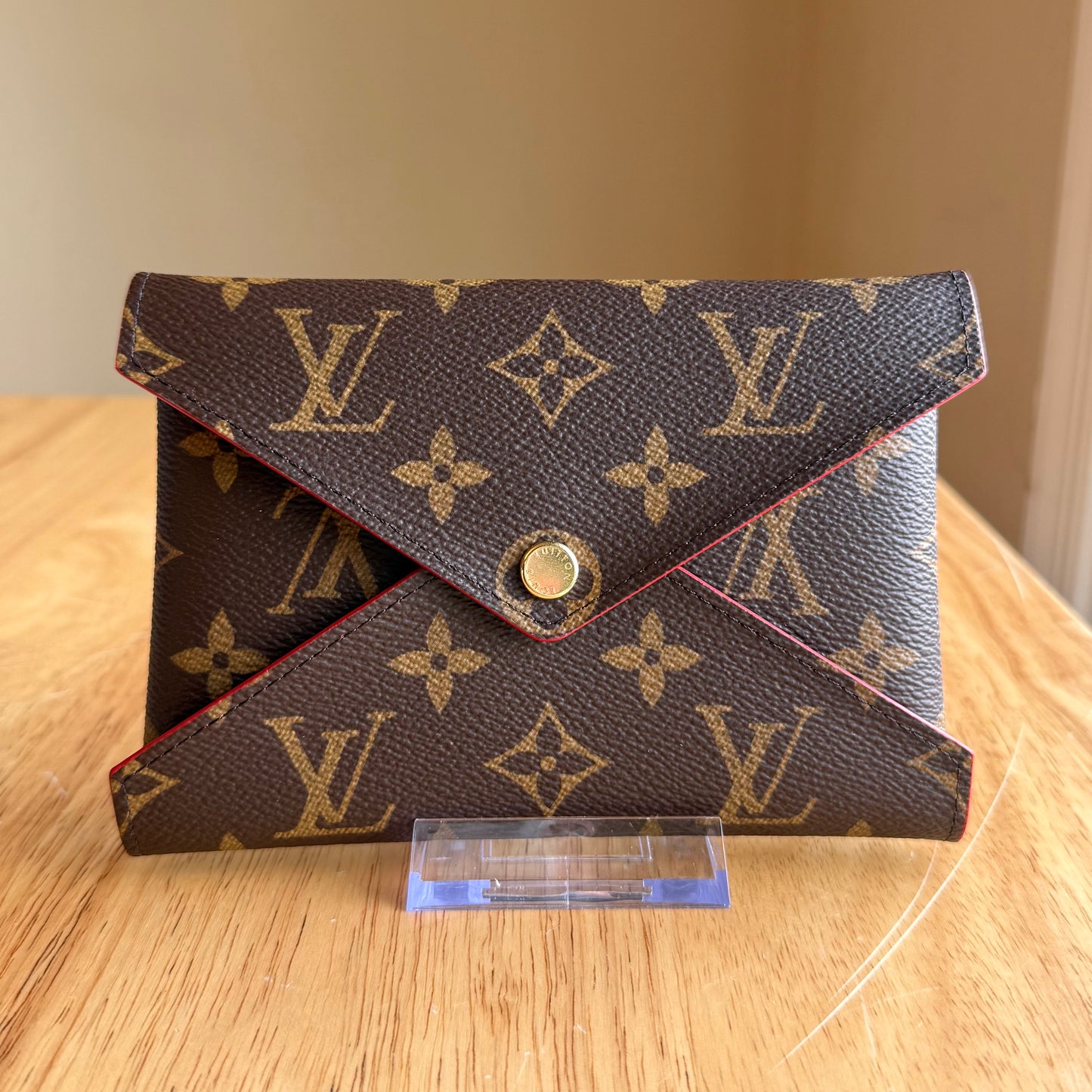 Monogram Kirigami Pochette (Medium)