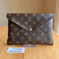 Monogram Kirigami Pochette (Large)