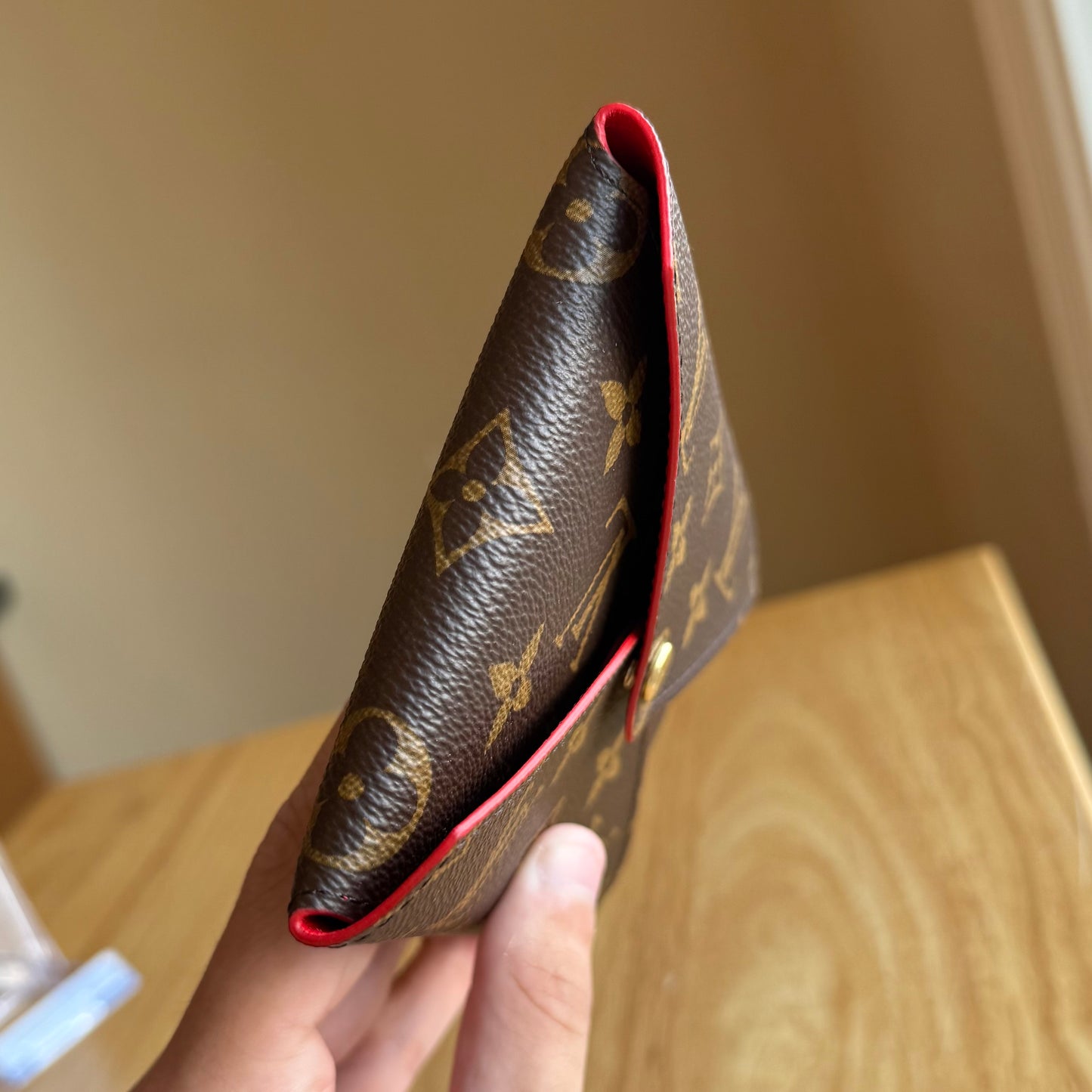 Monogram Kirigami Pochette (Medium)