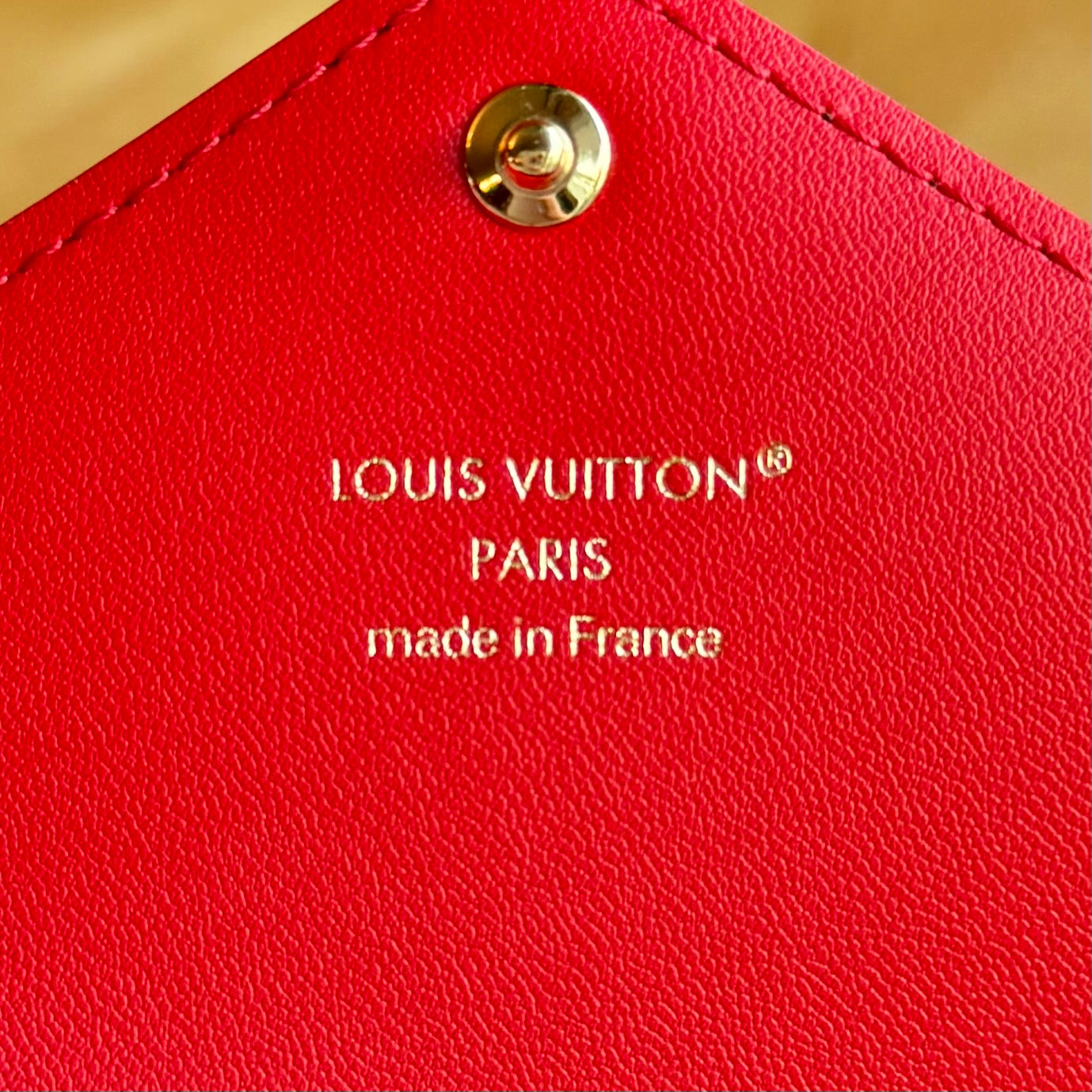 Monogram Kirigami Pochette (Medium)